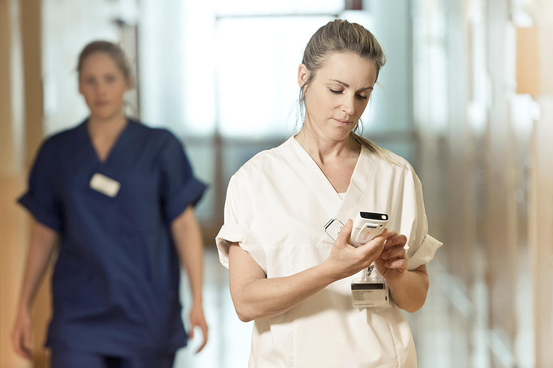Nurse using MYCO device in hospital